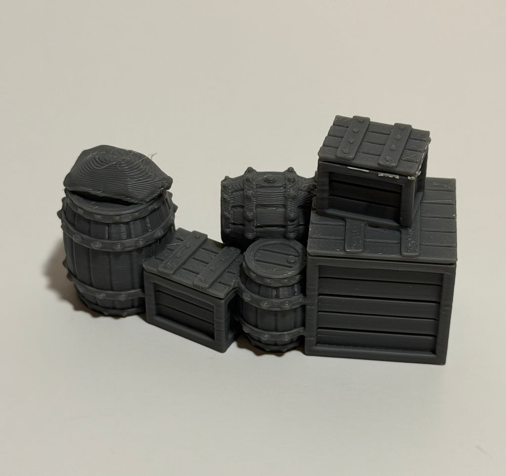 Tabletop scatter terrain set - side view showing crate and barrel details